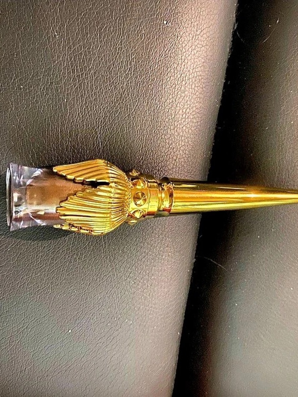 Christian Louboutin eye color Amazonite (gold)